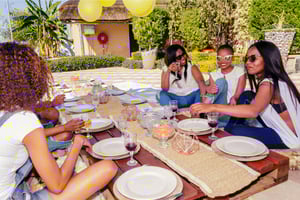 A group of friends having an outdoor party